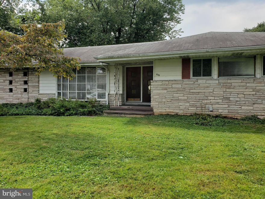 Welcome to this Custom Built home by original owner dating back to the 1968. This property sits on 4 lots. There are 2 Tax ID Parcels 05-012-472-003 home and 05-012-472-006 vacant lot. They are both being sold together, total acres equal to 0.2651 just over a quarter acre. This home offers 3 Bedrooms, Sunken-in Living room with brick fireplace opening up to Dining Room offering an open floor plan, large Eat-in Kitchen. Full bath with double sinks and a laundry shoot. You will find bonus room which was used as a den with its own brick fireplace with sliding glass doors opening to the very large and spacious fenced rear yard. The basement is divided into two portions. A finished portion offering a built in bar and built-in seating with storage compartments and half bath. The other side is unfinished portion for storage and houses heater and oil tank. Inside access to large attached garage. This original owner used 1x6 tongue and groove subflooring in most of the house instead of particle board for subfloor, showing his pride of craftsmanship. This house is being sold in AS-IS Condition. Buyer to be responsible for all repairs, Lender required repairs and Bristol Township Use & Occupancy.