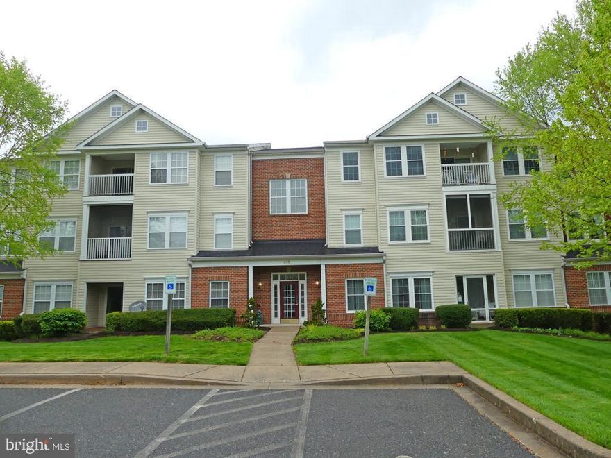 Welcome to your new home in the sought-after community of Spenceola Farms, located close to local markets, shopping and restaurants! The 1st floor 2 bedroom/2 bathroom condo is PRISTINE with upgrades throughout! Boasting hardwood floors and illuminated by natural sunlight, this home offers an enclosed patio, custom window coverings, a huge walk-in master bedroom closet, as well as S/S appliances, elevator access. This home has a nearly unheard of 2 car garage PLUS a bonus storage room. HVAC 2020. If you are looking for an immaculate, move-in ready home...and if you are ready to say goodbye to lawn care and snow removal concerns...this is the home for you!