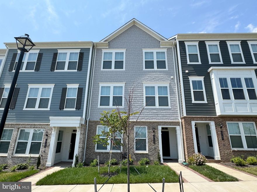 BEAUTIFUL WATER VIEWS!! **NOTE: ZILLOW HAS WRONG MAP LOCATION - PHOTO OF CORRECT MAP IS IN PHOTOS ATTACHED**
Welcome to 1745 Riverbluff Avenue, a beautifully upgraded townhome nestled in the highly sought-after Potomac Shores community in Dumfries, VA. This newer construction home boasts 3 spacious bedrooms, 2 full and 2 half bathrooms and an impressive array of modern features perfect for comfortable living and upscale entertaining.
Enjoy serene views of the Potomac River from your expansive private deck, which features a built-in natural gas grill—perfect for summer cookouts with a view. The interior is just as impressive, featuring an elegant glass-enclosed wine cabinet, contemporary finishes throughout, and a gourmet kitchen ideal for the home chef. The garage includes overhead shelf storage, offering smart solutions for organization and extra space.
Living in Potomac Shores means access to world-class community amenities, including a state-of-the-art fitness center, swimming pools, scenic walking and biking trails, tennis/pickle ball courts, and the Jack Nicklaus Signature Golf Course. The HOA also includes internet.
Ideally located near commuter routes (I-95 and Route 1), the VRE train station (under construction), and just minutes from shopping, dining, and recreational opportunities at Leesylvania State Park and the Potomac River waterfront, this is Northern Virginia living at its best.
Don't miss your chance to enjoy luxury, convenience, and community in one of the region’s most dynamic neighborhoods.