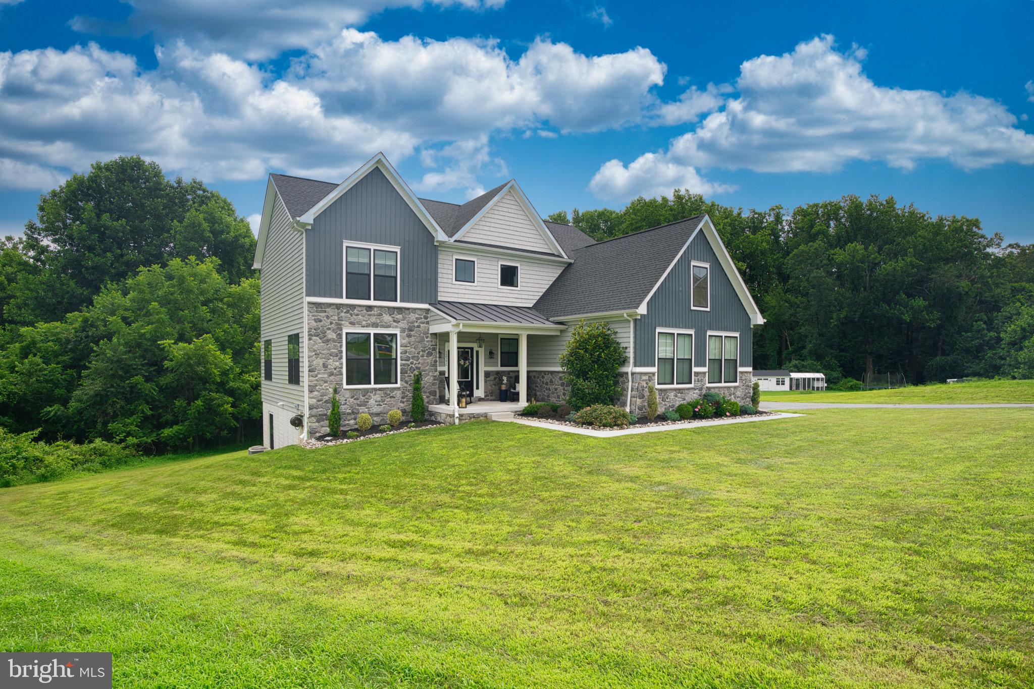 **Professional Photos to be uploaded prior to going active**
Built in 2019, this rarely available, almost new, spacious colonial home is located in private/wooded subdivision with a 2 acre lot. The Gatewood model features an open floor plan with gourmet island kitchen w/ granite counter-tops, stainless steel appliances, upgraded cabinets with self closing doors and drawers including a morning room and mudroom off of 2-car garage. Hardwood floors throughout main level, gas fireplace, upgraded trim package, upgraded tile package, and abundant recess lights. Four large bedrooms on upper level owner suite with walk-in closet to include super shower with separate soaking tub in bathroom. Fully finished lower level with a full bathroom. Over 4000 square feet of living space! Don't let this opportunity slip away!