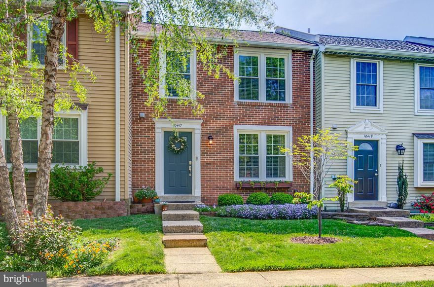 STUNNING HOME IN MINT  CONDITION!!!Welcome to 10417 Graystone Court, a beautifully maintained and thoughtfully designed townhome in the sought-after Flint Hill Manor community. The neighborhood is characterized as peaceful and friendly. Nestled in the heart of Oakton, this home offers a  blend of tranquility and convenience. Flint Hill Manor is surrounded by expansive  green space  offering a rare sense of privacy. The community is a warm family-friendly environment that captures  a true small-town feel - just moments from everything Northern Virginia has to offer.
Tucked away on a quiet, low-traffic street, yet incredibly convenient - minutes to major commuter routes, I-66, shopping, restaurants, and everyday essentials. Top-rated schools - Oakton school pyramid! A short walk to Borge park!

Offering approximately 1,820 finished square feet across three levels, this home delivers a perfect blend of comfort, style, and modern design features. Updated appliances!
The main level welcomes you with stunning hardwood flooring, recently refinished, and a bright, open layout filled with natural light. The spacious living room flows effortlessly into a dedicated dining area, creating an ideal space for  entertaining. Just beyond, the kitchen offers a practical and inviting layout with plenty of room for casual dining, making it a natural hub of the home. The back of the home is truly special -  windows overlooking a wide, open green space with peaceful sight lines that bring in abundant natural light along with a strong sense of privacy.

Primary bath  & closet refinished in 2025

Upstairs, the primary suite provides a peaceful retreat with generous space, large windows, and a private en-suite bath. Two additional bedrooms offer flexibility and comfort, along with a well-appointed full bath. The upper level is designed to feel both open and functional, with a layout that maximizes light and livability.

The fully finished lower level adds valuable living space, featuring a large recreation room centered around a charming brick fireplace—perfect for cozy evenings or hosting gatherings. This level also includes a convenient half bath and walkout access to the fenced backyard, creating a seamless connection between indoor and outdoor living.

HVAC 7 Water Heater recently replaced in 2020!

Step outside to a private, fully fenced backyard with a slate patio, offering a quiet setting for outdoor dining, entertaining, or simply enjoying fresh air. The patio opens directly to the common green area, creating the feel of an expansive backyard without the maintenance! Surrounded by mature crape myrtles in the backyard providing shade with their beautiful pink blooms all summer long.

The home also includes two assigned parking  spaces with additional neighborhood visitor parking, and ample street parking for guests. 

A friendly close-knit community with exceptional neighbors fostering a strong sense of belonging. The neighborhood offers exceptional convenience with quick and easy access to I-66 and Route 123, along with a wide variety of grocery stores, restaurants, and everyday essentials just minutes away. Nestled in the heart of Oakton, Flint Hill Manor is a charming, tree-lined community with easy access to the Vienna Metro, major commuter routes, and highly regarded Fairfax County schools. Nearby destinations such as Oakton Shopping Plaza, Nottoway Park, and Oakmont Rec Center provide even more options for shopping, recreation, and outdoor enjoyment.

The HOA includes lawn care, landscaping, snow removal, trash and recycling.

Ideally located and thoughtfully designed, this home combines comfort, convenience, and a welcoming neighborhood setting in one of Northern Virginia’s most desirable areas.

 AN EXCEPTIONAL & RARE OFFERING in one of NOVA's most desirable neighborhoods!