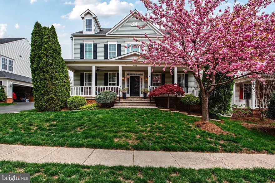 Welcome to Your Dream Home in the Heart of Broadlands

Tucked away in the highly sought-after Broadlands community, this beautifully updated residence blends timeless charm with modern luxury. From the moment you arrive, the inviting front porch and side-load two-car garage set the tone for the comfort and style that await inside.

Step through the front door and into a sun-drenched two-story foyer, where soaring ceilings, gleaming hardwood floors, and a dramatic staircase create an immediate sense of elegance. Fresh interior paint and upgraded lighting to include an almost $10,000 Restoration Hardware globe chandelier,  enhance the bright, open feel throughout the home.

The formal living and dining rooms, accented by a bay window, offer the perfect setting for entertaining or quiet evenings at home. At the rear of the home, the updated gourmet kitchen is a chef’s dream—featuring a spacious island, stainless steel appliances, and direct access to a low-maintenance Trex deck. From here, stairs lead to a fully fenced backyard oasis, complete with a stone patio and a cozy wood-burning fireplace—ideal for year-round gatherings.

The expansive family room is filled with natural light and boasts a vaulted ceiling and a gas fireplace with a stately mantle. Just off the main living space, a private office with French doors provides the perfect work-from-home retreat.

Upstairs, you’ll find four generously sized bedrooms and two full baths. The serene primary suite features dual closets and a spa-inspired en suite bath with double vanities, a soaking tub, and a separate shower. Convenience continues with an upstairs laundry room and an updated hall bathroom serving the secondary bedrooms.

The fully finished walk-out basement expands your living space with a large rec room, a fitness area, a full bathroom, and a fifth bedroom—ideal for guests or multi-generational living.

This home is not only beautiful but also meticulously maintained with major updates throughout:

Kitchen Renovation (2016): New stove, oven, and microwave
Appliances: Dishwasher (2022), Refrigerator (2024)
Primary Bath Remodel (2018)
Roof (2020), AC (2018), Water Heater (2015)
Multi-zone irrigation system for easy lawn care
Unbeatable location:

3 minutes to Route 267
15 minutes to Dulles Airport
5 minutes to the Silver Line Metro (Ashburn Station)
Close to the upcoming Ashburn Farm Rec & Community Center
Living in Broadlands means enjoying a resort-like lifestyle with access to three community pools (including an Olympic-sized pool), tennis and basketball courts, miles of scenic trails, and a state-of-the-art fitness center—all included in the low monthly HOA fee, which also covers full lawn maintenance.

With top-rated schools, endless amenities, and convenient access to shopping, dining, and major commuter routes, this home offers the perfect blend of luxury, comfort, and convenience.

Don’t miss the opportunity to call this exceptional property home. Schedule your private tour today!