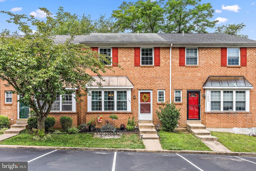 Welcome home to 1551 S. Coventry Lane,  a charming brick townhome located in the desirable Coventry Village Community.  This delightful home is a perfect blend of style, functionality, and comfort, offering a warm and inviting atmosphere. As you enter through the hardwood foyer, find the spacious dining room area, flanked with beautiful hardwood floors that add a touch of elegance. The large kitchen boasts modern amenities such as newer appliances, tile backsplash, and loads of countertop space, perfect for the family cook!  The first floor also hosts a powder room, ensuring practicality for daily living. Just outside of the family room, sliders take you to the newly renovated deck, backing up to a private wooded area, perfect for an outdoor retreat. The lower level of this townhome is a hidden gem, featuring a finished tile basement with an outside entrance and an additional full bath. This space opens up possibilities for an extra bedroom, home office, recreation room, or whatever suits your lifestyle. It also hosts a large area for storage, and laundry. Upstairs, you will find three generously sized bedrooms offering ample space for rest and rejuvenation, and a full sized updated bath. Other notable highlights of this home are: Newer windows throughout, 2022, new bedroom ceiling fans 2019, new hot water heater, 2022, newer kitchen appliances 2018, newly renovated deck 2024, newer carpeting stairs an upper hallway, 2024, and newer landscaping in the backyard. One of the unique features of this townhome is its desirable location, backing up to serene woods, providing a private and peaceful backdrop.  Don't miss the opportunity to make 1551 S Coventry Lane your new home. Call and schedule your appointment to see this home today!