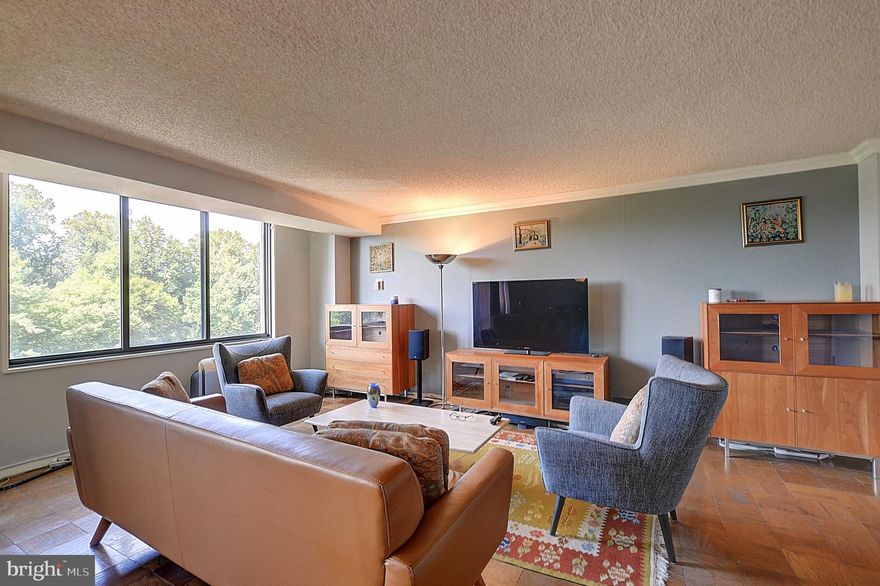 Welcome to refined elegance in this eloquently updated 981 sqft, 1 Bedroom, 1 Bath unit at the prestigious Promenade. Upon entering, you'll be captivated by an open floor plan awash in natural light, accentuated by beautifully finished floors and intricate crown molding. The kitchen serves as a culinary sanctuary, furnished with top-of-the-line stainless steel appliances and crafted with your utmost convenience in mind. As an extension of this exquisite living space, the large balcony offers panoramic views of lush greenery, serving as your personal oasis and elevating your at-home experience.

The bathroom adds another layer of luxury, featuring a towel warmer that not only ensures your towels are toasty and comfortable but also adds a spa-like atmosphere to your daily routine.

The monthly Coop fee not only covers all utilities but also grants you access to an array of premium amenities. Indulge in resort-style living with Indoor & Outdoor Pools, 7 Tennis Courts, Pickleball, a Racquet Club House, and a State-Of-The-Art Exercise & Fitness Center complete with an indoor pool, sauna, lockers, and a hot tub. Enjoy the added convenience of a 24-Hour Security Gate House, Front Desk service, a remodeled arcade with a variety of stores, and a restaurant offering outdoor seating by the pool. Additional on-site services include a convenience store, dry cleaners, package room, beauty salon, Party & Game Room, and a Travel Agency.

Situated in a prime location, the Promenade provides easy access to the Red Line Medical Metro Stop, NIH, Medical Center, Walter Reed, Downtown Bethesda, and major highways like I270 and 495. The nearby Wildwood Shopping area meets all your shopping needs, featuring a Giant, CVS, Bethesda Bagel, Starbucks, and Balducci's Gourmet Food Store.

For those looking to move right in, the owner is willing to sell the furniture.

Experience the pinnacle of refined living in this eloquently updated unit. Schedule your private tour today.