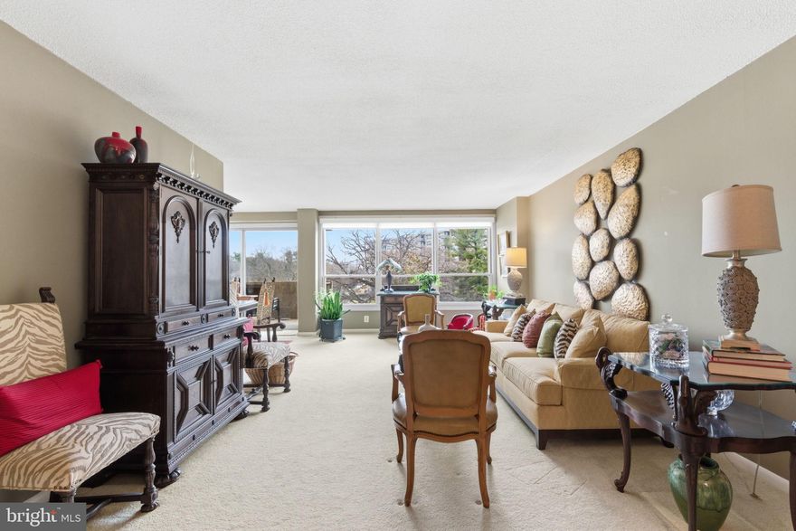 Welcome to this beautifully updated 2-bedroom, 2-bath condominium at Green Hill, ideally located in Wynnewood along the desirable City Avenue corridor. Situated within one of the Main Line’s most established condominium communities, this residence offers modern updates, spacious living, and convenient access to both suburban amenities and Center City Philadelphia.

Inside, the newly renovated kitchen and bathrooms create a fresh, modern feel throughout the home. The fully equipped kitchen features a breakfast bar, ample cabinetry, and open sightlines to the dining and living areas, making everyday living and entertaining easy. The spacious living and dining area is filled with natural light and opens to a private patio off the living room, providing a relaxing outdoor extension of the home.

The primary bedroom is generously sized with excellent closet space. A versatile second bedroom or den includes a custom California Closet Murphy bed, allowing the space to easily function as a guest room, workspace, or flexible living area. Two full bathrooms include one with a stall shower and the other with a tub/shower combination. Additional highlights include main-level laundry, custom window shades, and an upgraded electrical panel that meets township standards, along with extra storage located in the lower level of the building.

Residents of Green Hill enjoy a wide array of amenities within a beautifully landscaped gated community, including 24-hour security with a guarded front gate and doorman service. Optional amenities include a seasonal outdoor pool with cabanas, indoor pool and health club, tennis and pickleball courts, and community spaces for gatherings and events. Additional conveniences include on-site parking, optional garage parking, a community garden, playground area, and large-item laundry facilities.

Located in Lower Merion Township within the award-winning Lower Merion School District, Green Hill offers excellent accessibility to the City Avenue corridor, Main Line shopping and dining, and convenient transit options for travel into Center City Philadelphia and surrounding areas. This is a wonderful opportunity to enjoy low-maintenance condominium living with space, modern updates, and a full-service community lifestyle in a prime Main Line location.