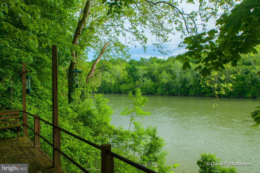 As close to the Shenandoah as you can get.Fish from deck? Restored, enlarged 3 BR bungalow on 2 lots. Lots of trees great inside with huge LR, excellent kit, huge 1st floor MBR, screened  porch out to deck. Multiple big windows, nice light. Bathrooms, incl 2 Mba's + powder, ceramic floors. Selling AS-IS, but well maintained. Two good sized sheds. . Home or weekend getaway. Close to MARC train.