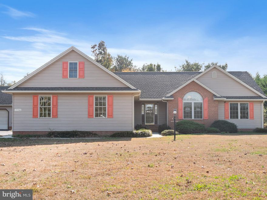 Welcome to this beautifully maintained 3-bedroom, 2-bath rancher in Greenwood, offering a bright open floor plan designed for everyday living and entertaining. The spacious living room features vaulted ceilings and a cozy fireplace, flowing seamlessly into the kitchen with stainless steel appliances, bar seating, and a dedicated dining area.

The primary suite showcases a vaulted ceiling, walk-in closet with built-ins, and a private ensuite bath complete with a soaking tub and separate stall shower. Step outside to the rear deck overlooking a fully fenced backyard that backs to trees, creating a private and peaceful setting. Additional highlights include a whole house generator, an attached 2-car garage plus a detached 2-car garage—perfect for storage, hobbies, or extra vehicles.