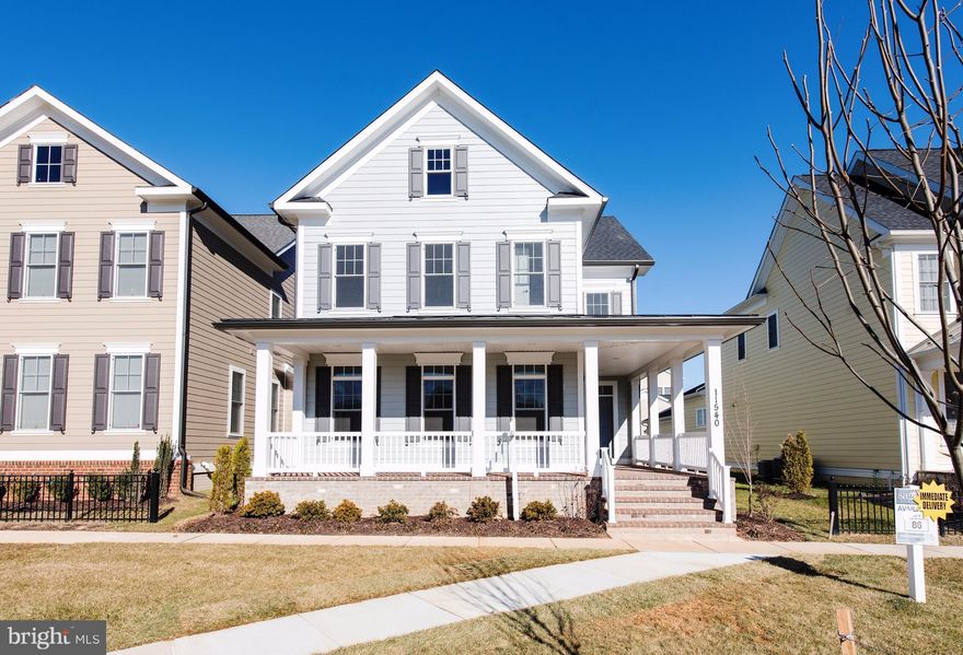 NEW LEED Certified geothermal & solar ready BOZZUTO SF Home in Maple Lawn features a Hardiplank exterior with brick watertable & full front porch, gourmet Quartz Kitchen, Main Level Hardwood, 4 Bedrooms, Owners Suite Hardwood, 4th level Loft, Rec Room and Full Bath.