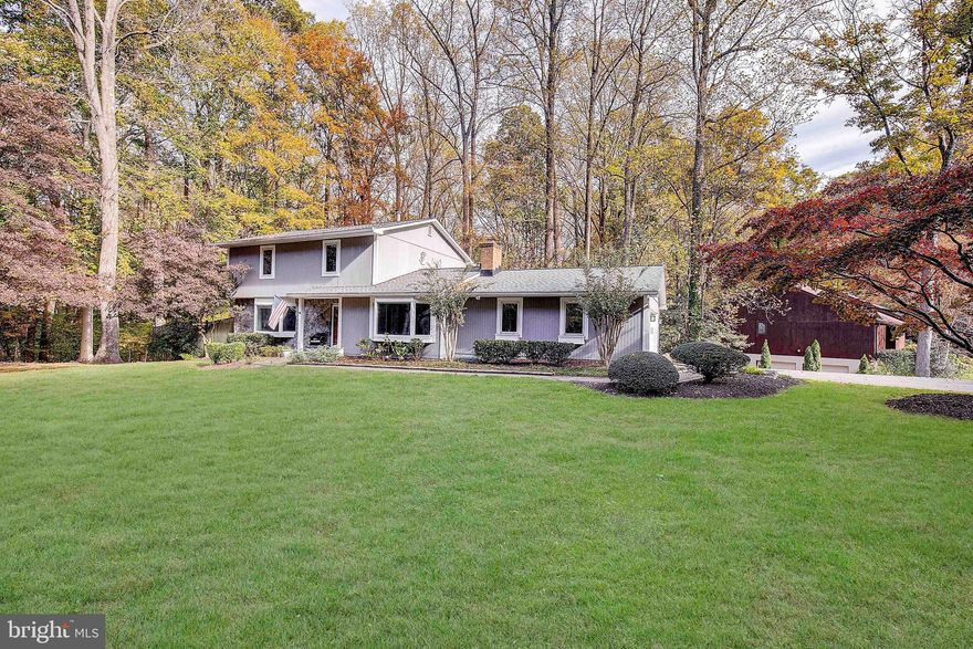 Fantastic new price!!!  Don't miss this opportunity to own a beautiful Saltworks on the Severn home! This cozy colonial has a spacious backyard that overlooks the woods. Enjoy cooking in the updated kitchen with French doors that open to the deck. Relax in the amazing screened porch off of the dining room. Gleaming hardwood floors on the main level. Large family room with fireplace. Living room features elegant built-ins on both sides. The lower level has a walk-out entrance and a full bath, plus a wet bar, fridge, microwave and a second laundry for your guests or as 4th bedroom/ in-law suite  as current owner used it as .  2 car side load garage. Convenient location to downtown Annapolis, USNA, mall and the hospital. Easy access to major highways for commuters