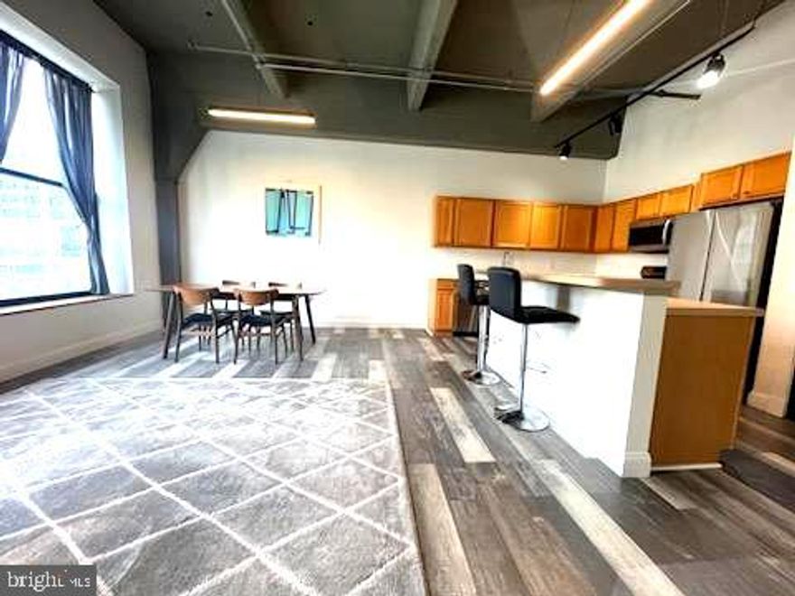 Over 1100 of beautiful square feet, this is a 2 bedroom unit where Broad Street is your TV.
It's the most exceptional city view in one of the first high rises in Philadelphia.
It's in the center of it all and has been fully renovated.

There is also an additional laundry room directly across the hall.

Everything you need is at your fingertips here from Grocery Stores, to Wine Shoppes, Pharmacies, Coffee Shops, and the most sought after dining and live music.

You can see the skyline as well as City Hall from your view and it can be a grand reminder of how far you've come in your making this your new home!