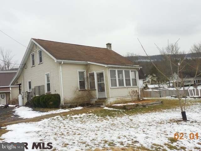 Cozy Cape Cod in the quaint town of Howard located across the street from the Howard West End Park & Sayers Dam! This super cutie delivers a charming eat-in kitchen with dining area, country farm sink with custom cherry cupboards. Pellet stove added in 2011 to help supplement heating costs. Walnut hardwood flooring in the living room. There are 3 bedrooms & 2 full baths as well as a handy first floor laundry room. Outside you will appreciate the oversized detached 2-car garage & an array of fruit trees, bushes to include dwarf Peach, Pear, Apple & Cherry trees, berry bushes, grape arbor & heartnut, hazelnut & Japanese walnut trees. http://rem.ax/2l1yOzF