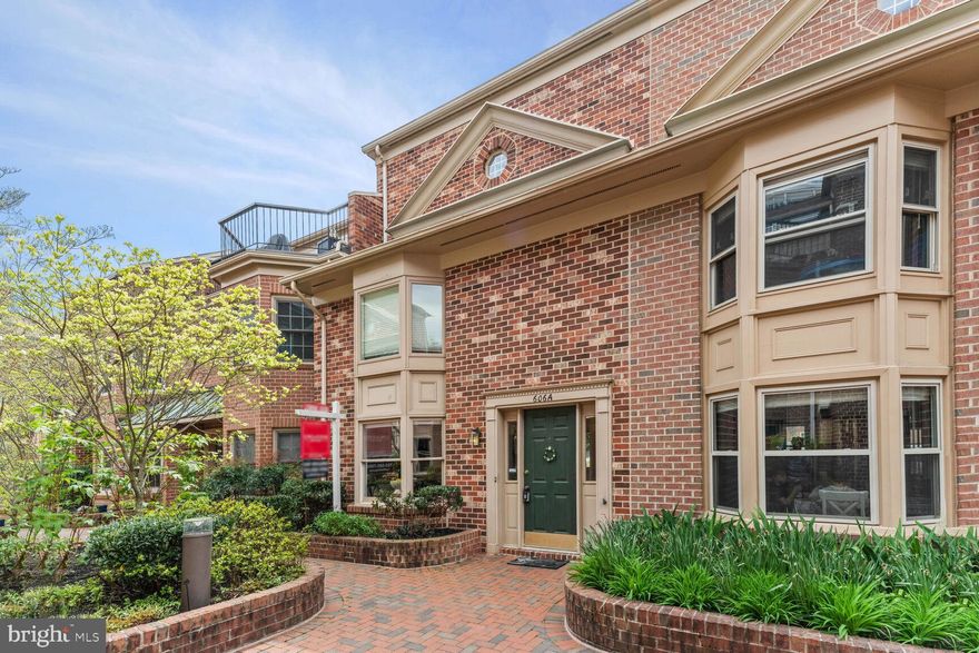 ***** OPEN HOUSE CANCELLED -- OWNER RATIFIED CONTRACT SUNDAY MORNING. ****** Just Listed! Four level Georgetown style brick townhouse in The Townes of Ballston community. Located on a quiet corner just a block away from all the energy and amenities that the Ballston neighborhood has to offer. Such a vibrant and convenient area! The home is just blocks from the Ballston Metro Station, many fine dining establishments, movie theaters, great shopping, the new Harris Teeter grocery store, as well as the Arlington, Co bike path. I-66 access, both East and West are a short distance making this a commuter’s dream, whether working in DC, MD or Northern Virginia. The unit is in the sought after location within the townhouse development featuring the larger square footage unit models. Oh, what a difference that extra square footage of living space makes! Bigger rooms, more storage and comfortable, practical living. The eat-in kitchen features stainless steel appliances, granite countertops, recessed lighting, pantry closet and ample cabinet storage and counter working space. The breakfast nook and bay window overlooks the lovely courtyard. Hardwood floors grace the main level living spaces where a wood burning fireplace awaits in the living room. The glass fireplace doors convey. There is a guest half bath on the main level as well as a large screened in porch for three seasons of enjoyment. This is a true three-bedroom townhome, including a top floor owner's suite with cathedral ceilings, a walk-in closet, and a custom linen closet. All the bedrooms have ceiling fans, and the flexible floor plan of this unit offers a wonderful bonus room on the second level. The perfect spot for a cozy den, convenient home office or additional guest sleeping area. This townhome is also one of the few models at the Townes of Ballston that has an upgraded and incorporated year-round separate owner's sitting area/suite. The perfect place to relax, unwind, enjoy a cool or warm drink and a good book. The lowest level features the second half bath, an additional bonus room, with a large closet and walk out to a fenced brick patio. The attached garage has parking for two cars, including one reserved spot just outside the unit door on the lower level. The Townes of Ballston community features a wonderful brick interior courtyard with mature trees, plantings and a gazebo feature to enjoy a quiet outdoor retreat. The unit has been freshly painted; new carpet installed along with several other updates. The home fills with tons of natural sunlight and has a wonderful western exposure. Location, Location, Location, a true Ballston address with the urban lifestyle yet with a single-family residential feel. Enjoy this quiet oasis on the doorstep of the Ballston Quarter and come be a part of this wonderful community!