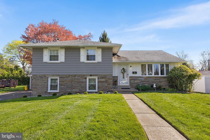 This charming and meticulously maintained split-level home features a spacious and open layout, plenty of storage space, a beautifully updated primary suite, and so much more, nestled in a quiet neighborhood just minutes from downtown Swarthmore. Your new home greets you with a large and well-manicured lawn, private driveway, and attached one-car garage. After heading inside, your entryway offers a large and convenient coat closet off to the left, with a sunny and sizable formal living room to your right. There are hardwood floors underneath the carpet in these rooms. The flow is excellent, as the living room seamlessly flows into the dining room just off the newer kitchen. The kitchen features Quartz countertops, an abundance of wood cabinetry and a comfortable workspace. Head down to the lower level, where you will find a cozy family room with a wood-burning fireplace, a convenient powder room and generously-sized storage closet. Across the hall, you will find the entrance to the attached garage. From here, you can head down into the basement, which is home to your laundry and an ideal place for storage. Should you need more living space, however, this area is prime to be finished into a home gym, playroom, guest suite - you name it! The second level of the home features three ample bedrooms, including a primary suite with a newly renovated bathroom. Each bedroom offers a large closet and solid oak floors. For history enthusiasts, this house is extra unique: it features an actual bomb shelter that was built during the Cuban Missile Crisis. And as far as present-day goes, this location is truly unbeatable. Enjoy the highly-rated Springfield Township school district, two train stations within walking distance, the Swarthmore Farmers Market and other amenities of downtown Swarthmore, walking trails at Swarthmore College, and you are even just a short 10 minute drive from downtown Media! Pride of ownership and care is evident in this lovely home ready for its next chapter. Make your appointment today!