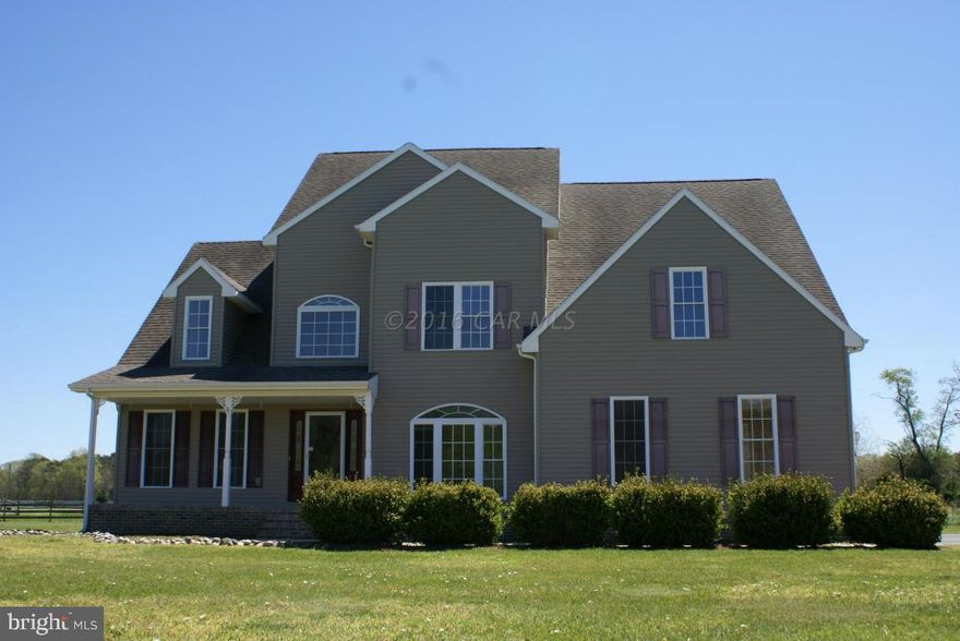 Spacious colonial home situated on 3.83 with private setting just minutes from town with flexible floorplan.  Formal Living and dining rooms, family room with wood burning stone fireplace.  Updated Kitchen with granite, center island and stainless appliances. Split staircase, 3rd floor finished for additional bedroom or bonus room.  2nd and 3rd bedroom have shared bathroom.  1st floor has bedroom and bath. Master Bedroom is on the 2nd floor with private bath and large walk-in closet. New paint and carpet. Large deck with built-in seating. Lot 4 is responsible for their portion on the drainage swale located on their property. One or two horses are allowed on the property.