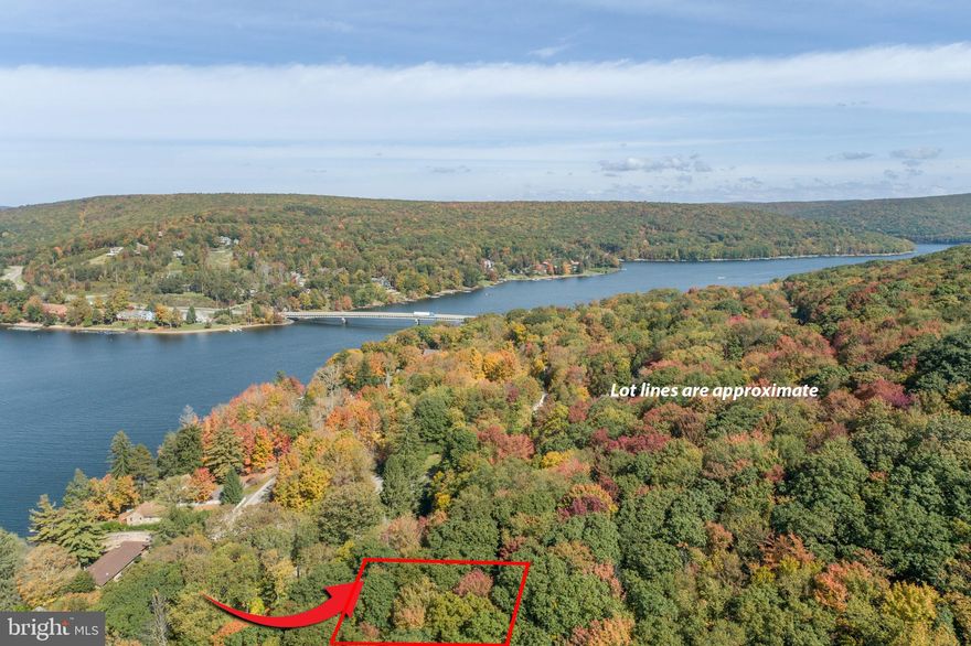 Beautiful lot located on Sloan Tract Road, right off of Lake Shore Drive with filtered views of Deep Creek Lake. Conveniently located minutes away from WISP,  Deep Creek Lake State Park, many restaurants and more.
