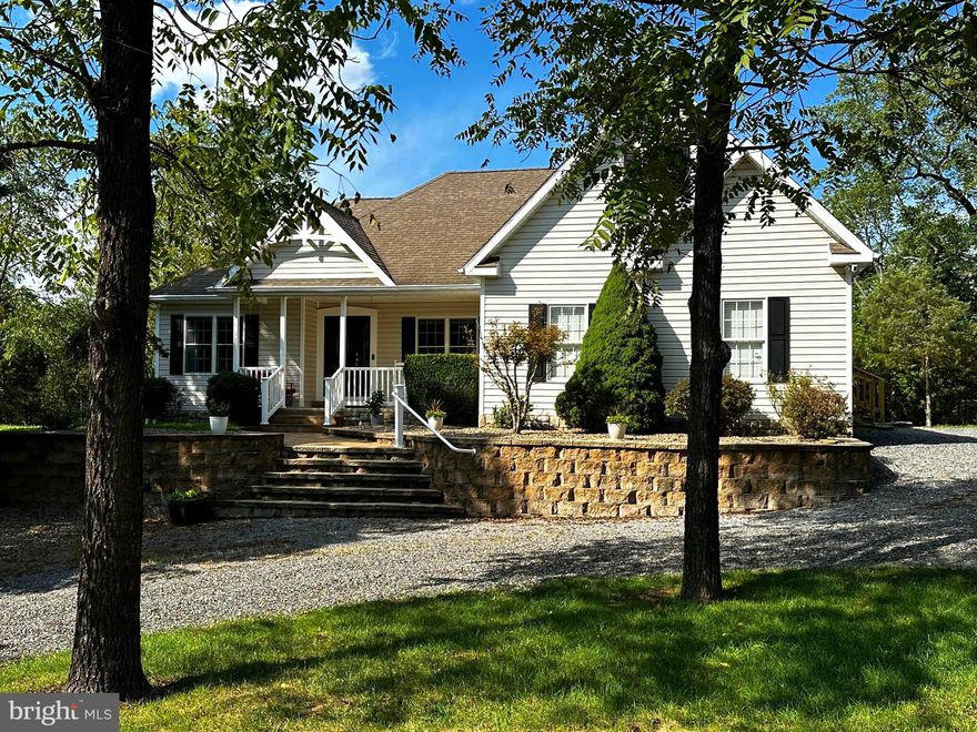 This charming CUSTOM BUILT home is perfect for everyone.  IMMACULATE and MOVE IN READY.  The large family room with vaulted ceilings and cozy gas fireplace is the perfect place to curl up in winter. In summer, you will love the back deck that is a perfect place for summer cook outs and relaxing. Entertain family and friends in this BEAUTIFUL open concept home; with both Eat-in Kitchen and Formal Dining.  Beautiful Granite countertops and stainless steel eye-catching appliances.  Enjoy your evenings in the beautiful Master Bedroom with cathedral ceiling, dual oversized closets and spacious Master Bath with heated tile floors & oversized walk-in shower. The possibilities are endless with an upstairs bonus room and large bright unfinished basement with ground level access. Come see this 3 Bedroom 2 and a half bath home before it's too late. Home is at the end of a no thru street.  A firepit can be found out back for star gazing and enjoy the nights of summer.  Close to all conveniences with the feeling of complete solitude.  Just 5 min from Petersburg, 15 min to Seneca Rocks, 25 min to Moorefield and 10 min to great Trout Fishing.  Take a Virtual Tour by clicking on the camera icon and fall in love with this Move-in Ready Home!