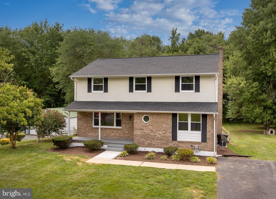 This beautifully updated colonial sits on .45 acres; however, it backs to woods so it seems like much, much more! With 5bedrooms/2.5 baths, a fully finished basement, it is ready for your suitcases! Upstairs boasts a large Master bedroom with en suite and walk-in closet, 4 other nice sized bedrooms share a large hall bath, the first floor has a wonderful living room, dining room (with lovely deck for entertaining or watching wild life visit!), mud room with laundry and huge family room! If this sounds like all you've been looking for, don't hesitate!