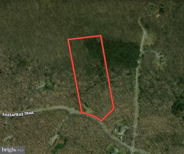 If you have been looking to live the mountain / lake lifestyle this 7 AC lot could be for you. The approved site plan for Minnetoska Lake Lot 18 is uploaded, and shows where the proposed house and approved well site and sewage disposal areas are. The lot is approved for a 4 bedroom maximum house. This lot is minutes away from Deep Creek Lake, several state parks and forests, the famous WISP Resort, restaurants, shopping & more! Before any construction begins all necessary permits must be obtained. Perc information is on file, verify any questions with Garrett County Environmental Health. If you love wildlife, this one if for you, with the property nearly bordering 25,000 acres of state land. Come take a look today and make this secluded paradise your new dream home or getaway hunting or fishing cabin. Schedule your private tour today!