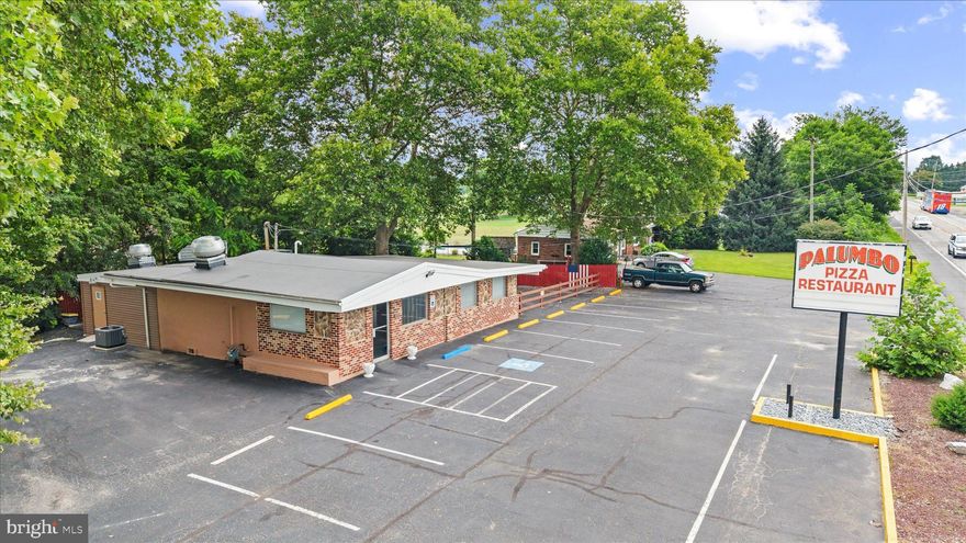 Welcome to 4795 W Market St - a turnkey restaurant ready for its new owner. Outfitted with everything an owner user would need to get started is included in the sale. New mechanicals, new stainless steel appliances including multiple freezers, fridges, fryers and more. The restaurant is equipped to serve plenty of customers with an indoor seating capacity of 44. Customers can also dine outdoors in the outdoor seating area on the right side of the building. 15 dedicated parking spaces including 1 handicap spot. Signage and visibility on W Market St and high traffic count. Call today to schedule a private showing!