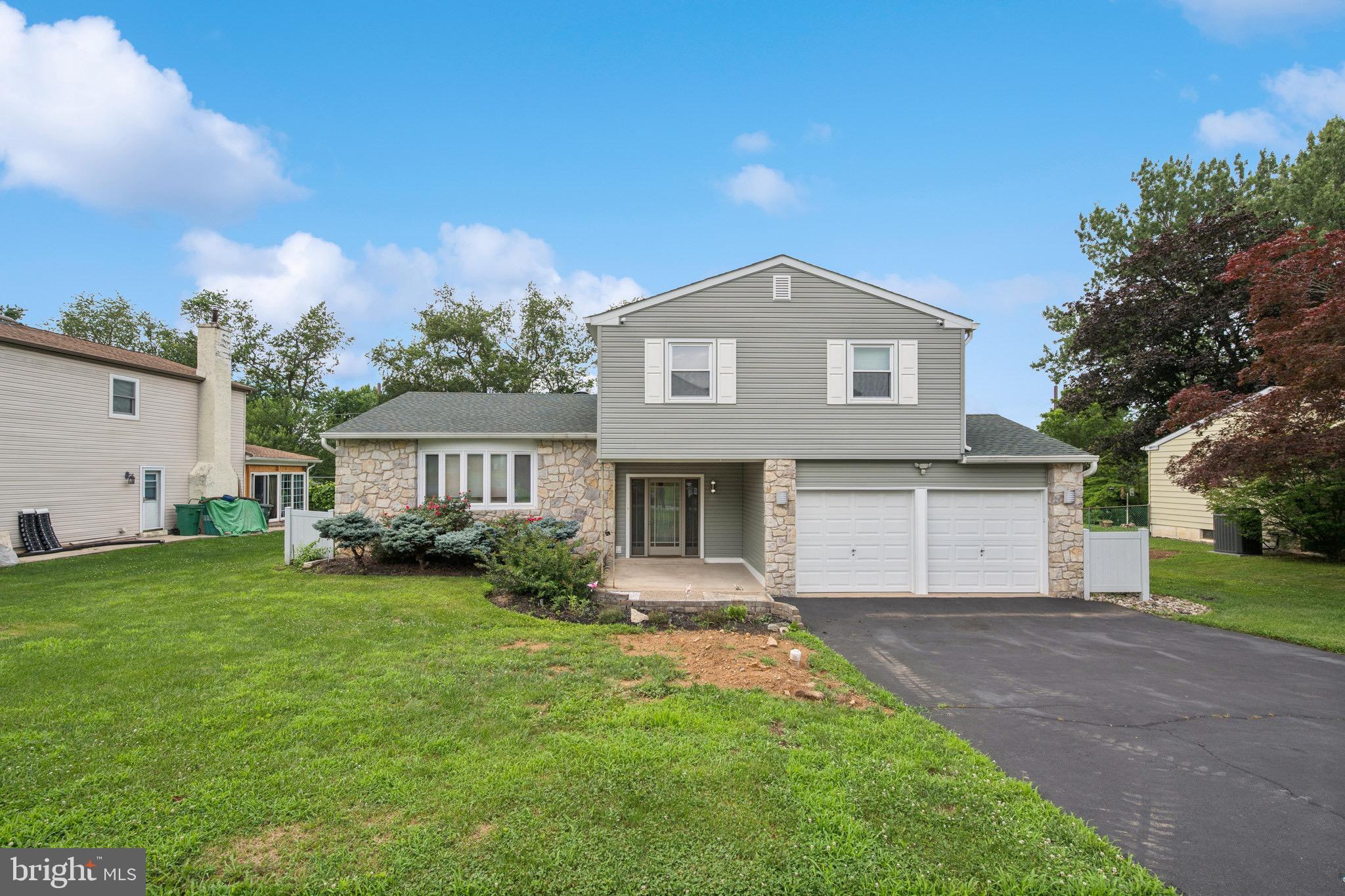 Presenting a meticulously maintained and thoughtfully updated four-bedroom, two-and-a-half-bathroom split-level residence, situated within the highly regarded Neshaminy School District. This single-family home, exemplifies pride of ownership and attention to detail throughout. The home features an open-concept layout ideal for modern living and entertaining. The spacious family room complimented with natural light and direct access to an expansive, covered rear patio—well-suited for outdoor gatherings. The eat-in kitchen and adjacent formal dining area, both of which overlook a private backyard. The living room is enhanced by a large bow window and a full wall of built-in cabinetry The generously sized primary bedroom with a walk-in closet and a fully updated en-suite bathroom. There is an additional 3 bedrooms and a a full hall bath. Additional amenities include a full basement, a two-car attached garage, and a convenient laundry/mud room with exterior access. This property offers a rare opportunity to own a well-appointed home in a sought-after school district, combining classic charm with modern upgrades. Make an offer today! Property is sold “as-is”.