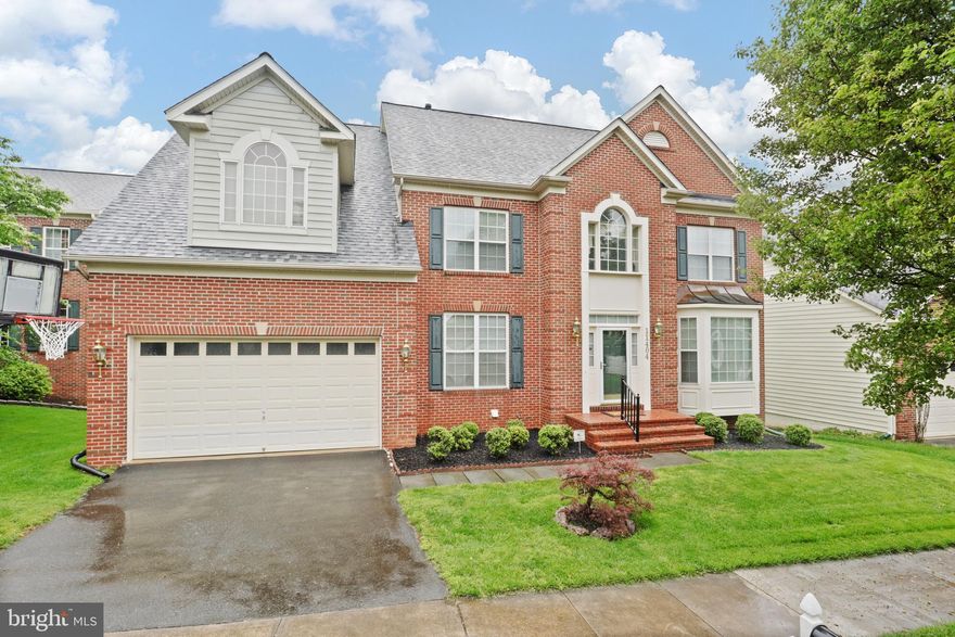 Brick front central hall colonial in sought-after Wootton HS district. Built in 2003 with 5,290 sq ft total finished living area. Soaring 2-story foyer, main level office. Gourmet kit w/granite counter, island, stainless steel appliances, and sunlight filled Florida room. Family room off kitchen with gas fireplace.  Spacious primary bedroom with sitting and his & hers walk-in closets. Luxury primary bath with separate tub & shower. Fully finished walkout level basement. Hardwood floor. Crown moldings. Large  deck. Cul-de-sac. 
New roof 2024, New refrigerator 2024. Brand new upper level HVAC system. Fresh paint. Wootton HS/Robert Frost MS/Travilah ES. Walk to N.Potomac community center.