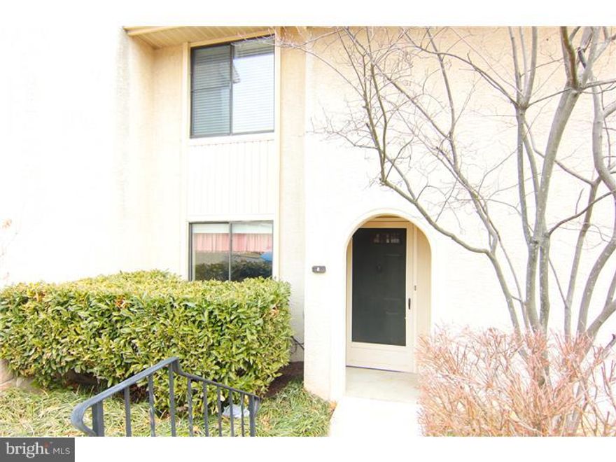 Welcome Home to a place where you close the door and the world behind you is taken care of by a wonderful townhouse association.  Walnut Hill is a community where the landscaping is meticulously maintained and the living is easy.   This center unit boasts 3 graciously sized bedrooms and 2 and   bathrooms.  Enter the foyer hallway (with beautiful half bath) to large light filled eat in kitchen. This kitchen was recently updated to reflect today's standards of granite counters, tile backsplash, new appliances with a flow for a chef.  The dining and living rooms open to each other to create a wonderful relaxing /entertaining area with real wood burning fireplace.  The space opens out to a beautiful outdoor private sanctuary that is ripe for bird watching and enjoying the environment.  Second floor has 2 bedrooms each with their own bathrooms. Third floor features a loft style bedroom/extra living space with skylights and room to breathe.  This unit has one of the few garage spaces available, and it is only steps from the home. A huge bonus to the community is the close proximity to trains, highways, center city and walkability to great restaurants, farmers market and award winning Chesnutwold elementary school.