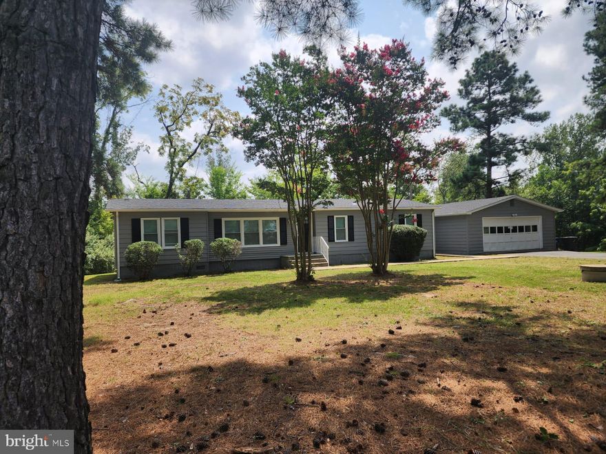 Beautiful one level home on 1.74 acres nestled in a peaceful setting within walking distance to Rocky Pen Run Reservoir. Enjoy seasonal water views and nature at it's best in this lovely 3 bedroom, 2 bath, 2 car garage, oversize deck, energy efficient HVAC, new roof, freshly painted and conveniently located to major routes, commuter lots, Geico offices and shopping. Property was fully remodeled and upgraded in recent years tovinclude: New Energy Efficient HVAC, upgraded electrical system including panel, new windows, new subflooring, new drywall with upgraded insulation, all plumbing throughout, full crawl space insulation.