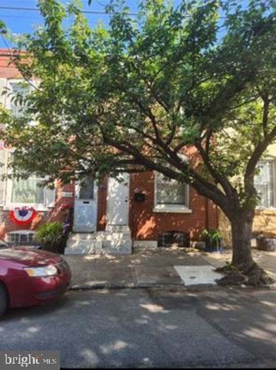 Great 3 Bed Barn row home that has 2 off street parking spots in a private driveway. Hardwood floors, white remodeled kitchen, remodeled hall bath. Large yard leading to paved driveway and off street parking. Live in the city but have a private driveway like the suburbs!