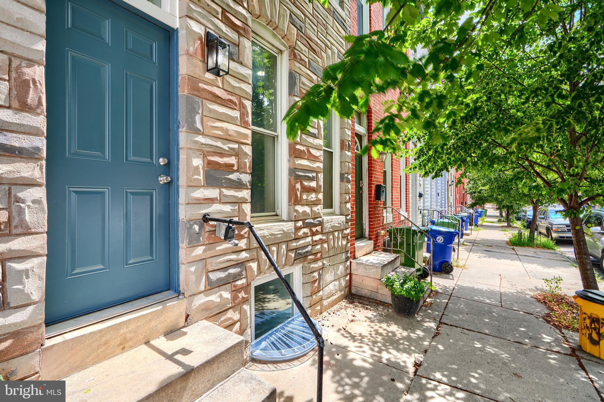 Welcome to Cross Street! This completely remodeled home is awaiting its new residentensts. Inside you have 3 bedrooms; 2 primary suites with their own private bathroom on the upper level and one bedroom with adjacent bathroom on lower level. As you enter you are greeted by beautiful new wood floors and a modern fireplace for those chilly Baltimore nights in the fall and winter. There's washer and dryer on the main level with a half bathroom for your convenience. Minutes from the Stadium, downtown Inner Harbor and many local restaurants. But don't worry, you'll always have parking with a private leveled back 'driveway'. Schedule your tour today!! Don't cross Cross Street off your list!!