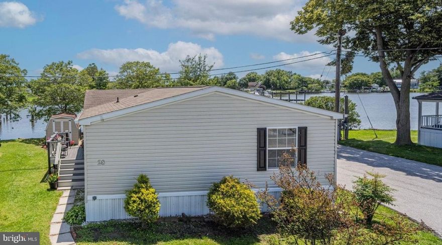 Waterfront Living at its Finest! Welcome to your opportunity to own a piece of waterfront paradise in the serene Baywood Community. Priced at $125,000 this charming mobile home offers the perfect blend of comfort, convenience, and breathtaking views. Property Highlights: Spacious Interior: Step inside to discover gorgeous LVP flooring throughout, complementing the open floor plan design. With three cozy bedrooms and two full baths, there's plenty of space for family and guests to relax and unwind. Scenic Views: Enjoy captivating views of the shimmering waters from almost every room, providing a serene backdrop for daily living. Convenient Location: Just minutes away from 695 and Trade Point Atlantic, this home offers easy access to amenities while providing a tranquil escape from the hustle and bustle. Private Patio: Sip your morning coffee or entertain guests on the patio overlooking Old Road Bay, offering a perfect spot to soak in the beauty of the waterfront. Storage Shed: A nice-sized storage shed is included, providing ample space for your outdoor equipment and belongings. Community Amenities: Park rent is $950 monthly and includes essential services such as trash pickup, access to a private pier, common area maintenance, and snow removal. Application Process: Interested in making this waterfront retreat your own? Contact Baywood Management for an application. *Please note that buyers must have cash, retirement funds, or private finance and show proof of funds.* Don't miss out on the chance to embrace the tranquil lifestyle of waterfront living. Schedule your viewing today and prepare to call this picturesque oasis home!