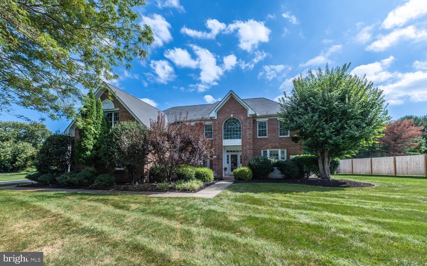Welcome to 702 Peach Tree Dr in the sought after neighborhood of Clocktower Woods in East Goshen Township situated on a lovely private lot. Pride of ownership shows throughout this stunning, sundrenched and impeccably maintained home with 4 bedrooms, 3.5 baths, over 4300 sq ft and an open floor plan that is great for entertainment and family life. You will enjoy the extensive millwork, upgraded flooring, updated kitchen with large island (52 x 87), lovely stamped concrete patio, 3 car attached garage, newer systems and Stand By Full House Generac Generator. Additional features include: 2 story entry foyer with curved staircase, hardwood flooring and wainscoting; spacious living room with lovely millwork; sundrenched dining room; office with French Doors and bay window; family room with vaulted ceiling, gas fireplace and plenty of windows; updated gourmet kitchen with large granite center island, white cabinets, beautiful backsplash, undercabinet lighting, hardwoods, walk in pantry; breakfast area with sliders to the patio and bar area with wine refrigerator and additional cabinetry;  large laundry/mud room with built ins, utility sink and access to back door; powder room; 2nd floor hallway lined with wainscoting; plenty of laminate flooring; primary suite with cathedral ceiling, ceiling fan, additional exercise/office/sitting room, two walk in closets; primary bath with soaking tub, shower, double sinks and linen closet; 3 additional bedrooms- one with an ensuite full bath; full hall bath with tub/shower; lower level with 12 ft ceilings ready for you finishing touches. The back stamped concrete patio is lovely and overlooks the beautiful, private, fenced in yard. Seller will provide Engineered Stamped Drawings for a roof over the patio. This fantastic home is conveniently located to Malvern and Paoli Train Stations, walking trails in East Goshen Park, Applebrook Golf Club, shops and dining in Malvern and downtown West Chester, surrounded by the finest private schools and in the Award Winning West Chester Area School District.  You will love living in Clocktower Woods!