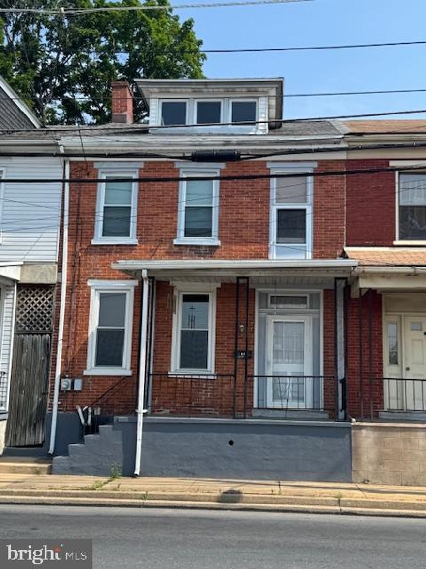 Semi detached Lebanon home. Move in condition. 1,840 sq. ft. living area. Eat in kitchen. Living room w/gas fireplace. Half bath. Enclosed porch/shop area. Upper level has 3 bedrooms, full bath, bonus room. Full basement. A nice, clean home that has been taken care of. Off street parking.