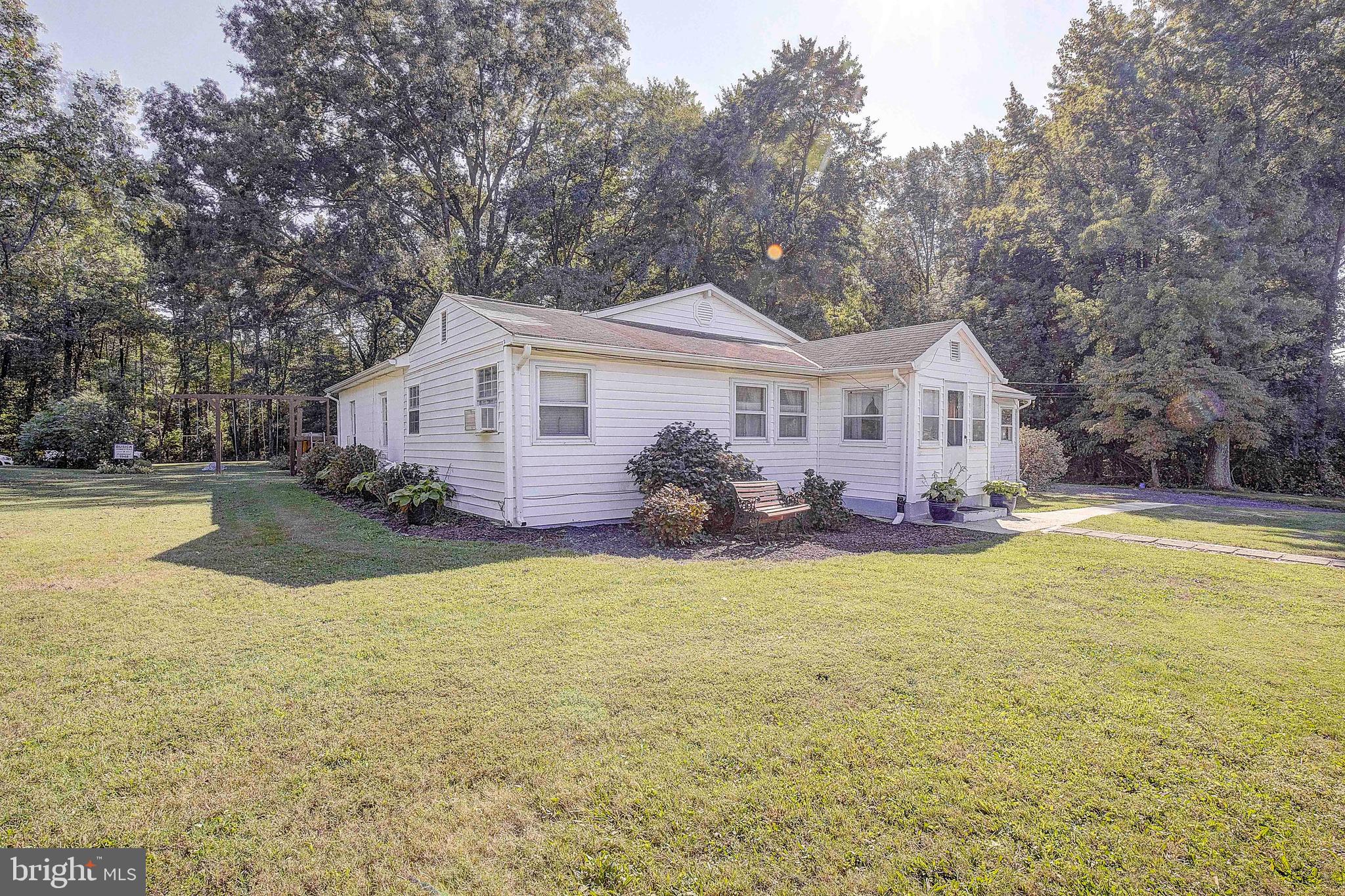 JUST LISTED! 3 Bedroom 1.5 Bath Rancher. Private setting with lots of parking. Multiple sheds and a 3 car fully functioning garage with separate driveway. Upstairs set up as in law apt with bathtub and kitchenette. Surrounded by mature trees with park like setting on almost an acre of land. This property has not been transferred in over 75 years.