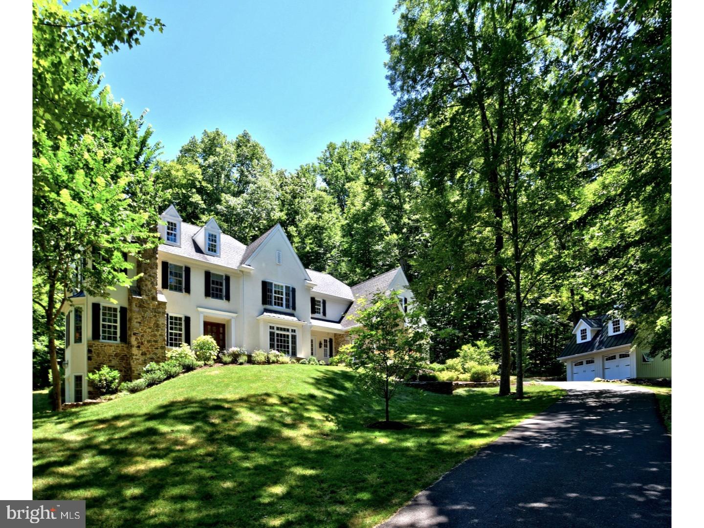 Situated perfectly in a storybook setting on Jericho Mountain in the heart of Upper Makefield sits this spectacular custom built Richard Zaveta home. A splendid 5.53 acre parcel, replete with walking trails, pond, gently flowing stream, koi pond, over 25 different species of hardwood trees including 2 rare American Elms, and perfectly maintained landscaping provides the backdrop for the ultimate in luxury, privacy and tranquility ? a world away yet just 10 minutes to Newtown and 12 minutes to New Hope. The classic foyer entry reveals a gorgeous staircase with beautiful white balusters and oak treads and railing, gleaming oak hardwood floors, impressive and plentiful crown molding, curved archways, fabulous floor plan and amazing views from every window throughout. To the right is the formal dining room and walk-through butler's pantry, to the left the formal living room with full masonry fireplace and triple bay window. The gourmet kitchen, with Wolf six burner cooktop, 48" Sub Zero, black soapstone counters, center island with farmhouse sink, cherry top counter seating for four, built in desk, and walk in pantry is contiguous to the large breakfast area (with access the 21x18 flagstone patio) & family room, making this the perfect floor plan for entertaining. The family room features 12' ceilings, walls of windows, full masonry fireplace and built-ins. A beautiful study with triple French Door entry to a screened in porch, large mud room, (offering a second front entry) built in cubbies, 2 powder rooms, rear staircase, and triple French Door access to the patio complete the main floor. The upper level boasts a luxurious Master Suite with tray ceiling, cozy sitting room, two walk-in closets. The Master Bath features his/hers vanities, whirlpool tub & oversized shower. Four additional bright, spacious bedrooms with large closet spaces (Princess Suite, Jack and Jill and Guest suite), laundry room, and walk up-stairs to a large floored attic with plentiful storage complete the upper level. The walkout lower level has a gym, theater room, entertainment/craft room, rough-in plumbing and framing for an additional full bath, and vast storage area with the ultimate work bench. A 3 car attached garage, 2 car detached garage with floored second level, security system, central vacuum, 2 zone heat/AC, & plentiful storage are additional amenities. The home and property have been lovingly maintained by the original owners and is in impeccable, mint, move-in condition.