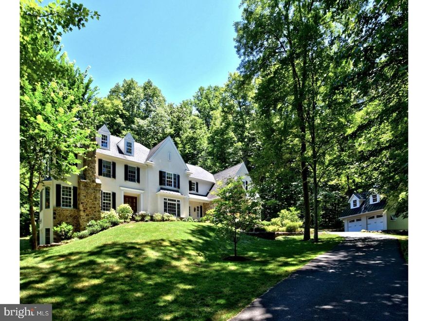Situated perfectly in a storybook setting on Jericho Mountain in the heart of Upper Makefield sits this spectacular custom built Richard Zaveta home. A splendid 5.53 acre parcel, replete with walking trails, pond, gently flowing stream, koi pond, over 25 different species of hardwood trees including 2 rare American Elms, and perfectly maintained landscaping provides the backdrop for the ultimate in luxury, privacy and tranquility ? a world away yet just 10 minutes to Newtown and 12 minutes to New Hope. The classic foyer entry reveals a gorgeous staircase with beautiful white balusters and oak treads and railing, gleaming oak hardwood floors, impressive and plentiful crown molding, curved archways, fabulous floor plan and amazing views from every window throughout. To the right is the formal dining room and walk-through butler's pantry, to the left the formal living room with full masonry fireplace and triple bay window. The gourmet kitchen, with Wolf six burner cooktop, 48" Sub Zero, black soapstone counters, center island with farmhouse sink, cherry top counter seating for four, built in desk, and walk in pantry is contiguous to the large breakfast area (with access the 21x18 flagstone patio) & family room, making this the perfect floor plan for entertaining. The family room features 12' ceilings, walls of windows, full masonry fireplace and built-ins.  A beautiful study with triple French Door entry to a screened in porch, large mud room, (offering a second front entry) built in cubbies, 2 powder rooms, rear staircase, and triple French Door access to the patio complete the main floor. The upper level boasts a luxurious Master Suite with tray ceiling, cozy sitting room, two walk-in closets. The Master Bath features his/hers vanities, whirlpool tub & oversized shower. Four additional bright, spacious bedrooms with large closet spaces (Princess Suite, Jack and Jill and Guest suite), laundry room, and walk up-stairs to a large floored attic with plentiful storage complete the upper level. The walkout lower level has a gym, theater room, entertainment/craft room, rough-in plumbing and framing for an additional full bath, and vast storage area with the ultimate work bench. A 3 car attached garage, 2 car detached garage with floored second level, security system, central vacuum, 2 zone heat/AC, & plentiful storage are additional amenities. The home and property have been lovingly maintained by the original owners and is in impeccable, mint, move-in condition.