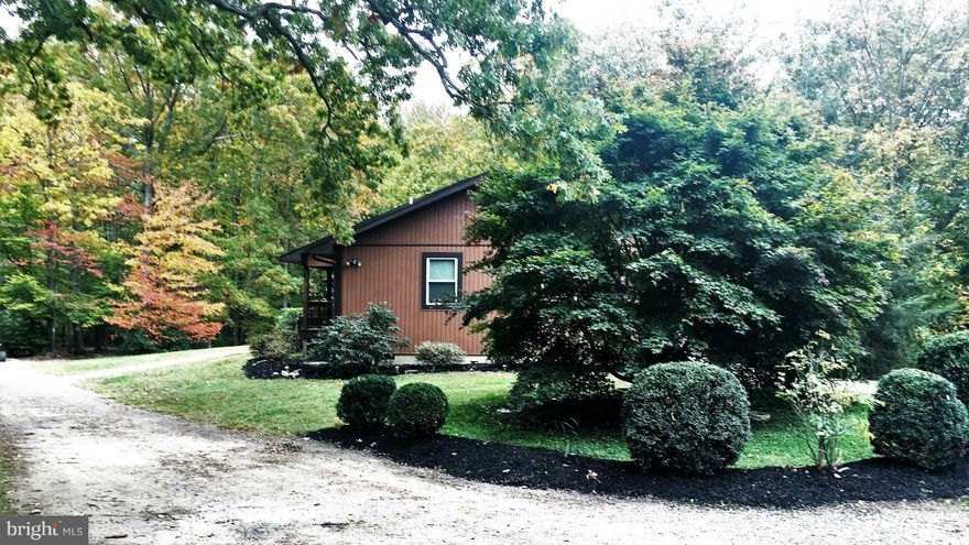 Wow!!! Are you looking for a multi-generational property that is situated on 5 beautiful private acres, and minutes from the National Harbor and the new MGM? It's your lucky day! This outstanding home has it all. 2 kitchens, 2 family rooms, 2 huge decks, huge detached garage that is every mechanic's dream with its own bath and office, above ground pool + lots of acreage for those outside amenities