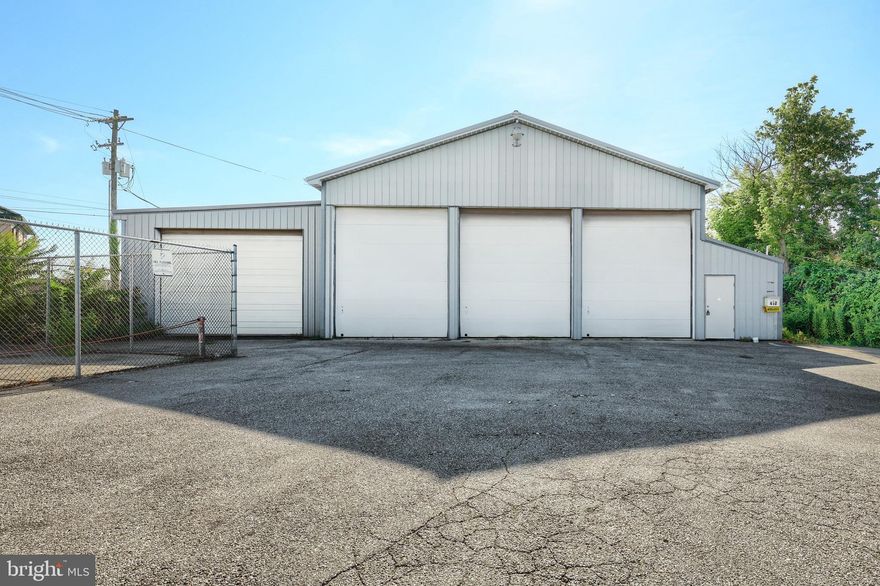Welcome to 410 Broadway – A Prime Commercial Opportunity in Hanover! This impressive 7-bay commercial shop is ideally situated near downtown Hanover and offers a versatile space perfect for a wide range of uses. Previously utilized for automotive restoration, the building is thoughtfully equipped for your business needs. Featuring a combination of garage doors, one 12'x16' and three 14'x12' this property offers exceptional accessibility for vehicles and equipment of all sizes. Inside, you'll find a media blasting room, dedicated paint room, and ample open floor space suitable for car lifts or custom workstations. The building includes a half bath and is powered by both 400-amp 3-phase and 200-amp single-phase electrical services, ensuring it can support high-demand equipment. Zoned Manufacturing, this location opens the door to a variety of permitted uses, see attached documents for the full list of possibilities. Whether you're expanding your current operations or launching a new venture, 410 Broadway offers location, flexibility, and functionality all in one place.