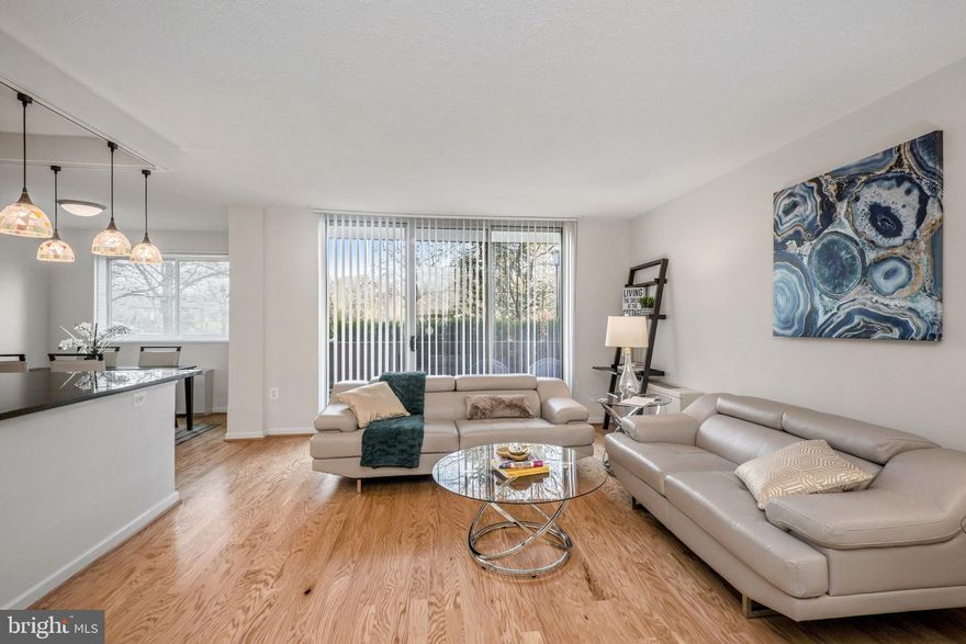 Seller paid 6 months of condo fees!! Spacious and bright corner unit with 2 bedrooms, 2 full baths.  Fresh paint in main rooms and new flooring! Stainless steel appliances, in-unit combo washer/dryer, 1 assigned parking space, 24/7 building security and in-unit alarm system.  Bike Room and Storage Room space available for rent, if needed. Takoma Overlook community is vibrant with amenities and activities to include private dog park to mingle with residents, outdoor swimming pool for those summer days, private tennis courts, playground with BBQ grilling area for fun outdoor time, Zen garden and a variety of community committees!  Location is unbeatable with Bus Station and future Purple Line a few blocks away. Restaurants, coffee shops and historic downtown are all close by! Seller provides Home Warranty!  One small pet per Owner, under 50 lbs, is allowed with registration. Condo fee includes ALL utilities! Click on video camera button for a virtual 3D tour from the comfort of your home. Open House cancelled for 12/5/20.