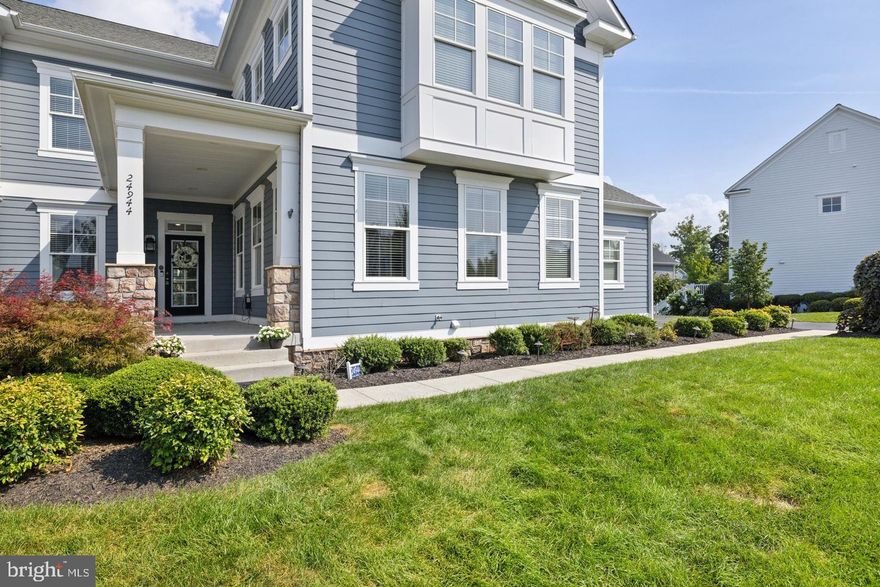 Located in the highly desirable Willowsford community, this beautifully upgraded 5-bedroom, 4.5-bath home offers a perfect blend of luxury, function, and modern design. The interior is anchored by a fully renovated chef’s kitchen featuring quartz countertops, custom cabinetry, under-cabinet LED lighting, a large island with prep sink, two pantries, and a workstation sink with accessories, along with premium Dacor graphite stainless appliances including a 48” six-burner gas range with griddle, double electric ovens with convection and steam cooking, modernist hood with Wi-Fi connectivity, counter-depth French door refrigerator with water and cocktail ice, dishwasher, and under-counter microwave. The main level showcases new luxury vinyl plank flooring, while the upper level features plush new carpeting and a spacious primary suite with frameless glass shower and custom closet system, complemented by custom closets in the secondary bedrooms. The mudroom is enhanced with a shoe storage system and refrigerator hookup with water and ice, plus an additional pantry with custom shelving for added organization. The lower level is ideal for entertaining with a media room wired for surround sound and a bar-style kitchen with granite countertops, tile backsplash, dishwasher, wine chiller, and built-in A/V speakers. Outdoor living is just as impressive with a large patio, 12’ x 12’ pergola, wood-burning fire pit with circular seating bench, and privacy landscaping, along with an invisible fence system surrounding the entire yard. Additional highlights include ceiling-mounted A/V speakers throughout, built-in security system, lawn sprinkler system, crown molding, and wooden blinds. Enjoy all the amenities of Willowsford including miles of trails, community pools, fitness centers, and farm-to-table lifestyle programming, with convenient access to major commuter routes, shopping, and dining — this home truly offers comfort, technology, and elegance in one exceptional package.