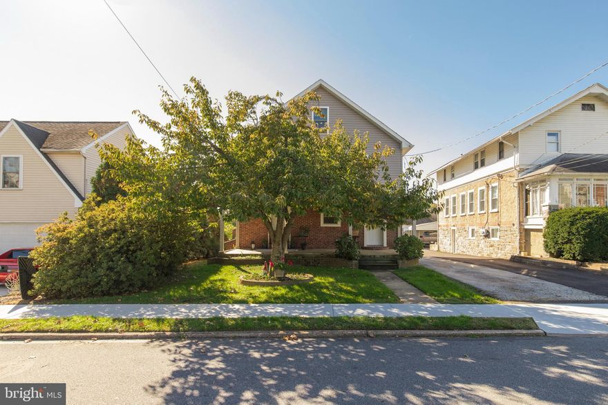 Magnificent Three Story Colonial featuring Four Bedrooms and Three and one Half Bathrooms with Oversized Two Car Detached Garage in very desirable Ridley Park Borough and Ridley School District. First floor features Spacious Living Room with High Ceilings,Recessed Lighting, Hardwood Floors, First Floor  Powder Room, Formal Dining Room with Triple Bay Window, Ceiling Fan and Recessed Lighting, Modern Kitchen with Maple Cabinetry, Granite Counters, Two Sinks, Frigidaire Gas 5 burner Stove, Bosch Dishwasher and  Outside Exit to Oversized  Trex Deck. Second Floor has Master Bedroom with Triple Bay Window, Hardwood Floors, Recessed Lighting and Beautiful  Master Bathroom with Granite Counter and Tile Shower, two additional Bedrooms, combination Hall Bathroom and Laundry Room, plus walk up to Three Floor. Everything is Brand New in the Last 4 years - roof, windows, kitchen, bathrooms, flooring, electrical, plumbing, heating and air conditioning. Too Many upgrades to Mention here - Beautiful home Inside with Finest Amenities. All gas thru out with gas hot air heat, domestic hot water, stove and central air conditioning plus two zone heating and air conditioning systems. RELAX on the Rear Trex Deck - perfect for barbecues and Family gatherings. The Oversized  Two Car Garage has a floored attic perfect for hobbies or storage. There is a one year home warranty to the buyer at settlement. Great Location convenient to I95, Blue Route ( I476), Phila Airport, Septa train to Phila and Wilmington, Ridley Park Central Business District , schools and shopping. Preview this Fine Home and Make a Serious Offer and Begin Making Your Own Memories The Fourth Bedroom is on the 3rd Floor with Skylights and another Full Bathroom.