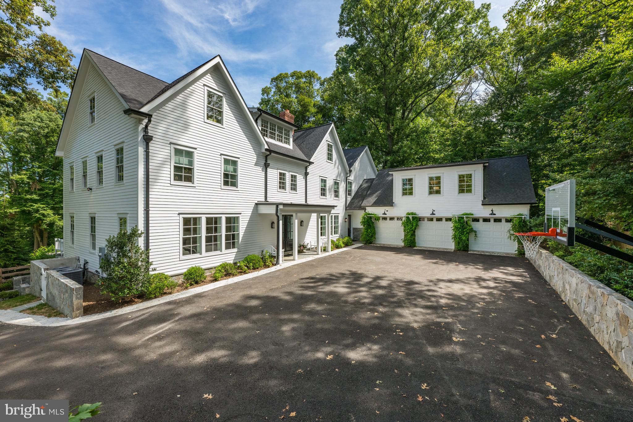 Home Sale Contingency with a 7- day kick out.  Welcome to "Old Trees", a new home  with a serene pool beautifully sited on an estate size lot that spans over 2.3 acres and is surrounded by magnificent 200 year old trees. Masterfully orchestrated by Federal Construction Company that is known to preserve and maintain attention to detail and the commitment to timeless design and construction quality. With this level of expertise, you can be sure that your home will be a place of beauty and tranquility for many years to come. The exterior features a 3-car Garage and a stone Carriage House complete with hardwood floors, bathroom and a separate Garage. The home contains reclaimed elements that become the central characters in the story. They include reclaimed ceilings, 1800s French bakery counter and an 1800s Hudson Valley Stepback. A 2-story Foyer welcomes you to the formal Living and Dining Room. The Kitchen is a dream with exposed beams and equipped with high-end appliances, custom cabinets, walk in Pantry and a cozy Breakfast area with custom accordion doors system that retracts offering the ultimate in indoor/outdoor living with unobstructed views The Upper Level features 5 Bedrooms! The Owner’s suite that is a retreat with a spa inspired Bath and huge walk-in Closet. To complete the Upper Level are 4 generous sized Ensuites. The 3rd Level boasts the Play Room and Craft Room with a Powder Room. Above the 3-car Garage is a Loft/Fitness Room with a Powder Room. Located in sought after Franklin Park, with nature trails adjoining the property that are perfect for morning walks and all with a short distance to shops, restaurants, Downtown McLean, Tyson, Downtown Arlington and Washington DC. *See video for approach.