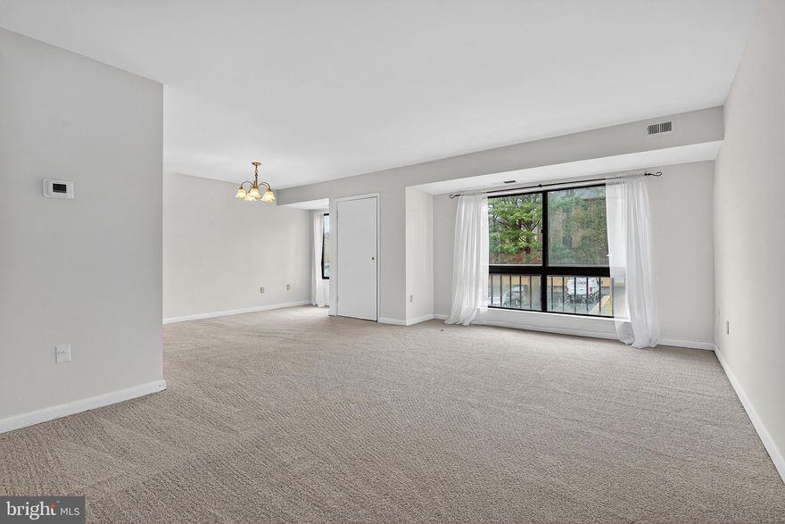 Welcome home to this beautifully refreshed 2-bedroom, 1-bath condominium in highly desirable Columbia, where comfort, convenience, and modern style come together effortlessly. This move-in ready home showcases brand-new carpeting and fresh, neutral paint throughout, creating a bright and inviting atmosphere. The kitchen features newer cabinetry, custom backsplash, new laminate flooring, and a crisp white appliance package—perfect for everyday living and entertaining alike. Enjoy the added convenience of an in-unit washer and dryer, along with exceptional storage, including a spacious walk-in coat closet. The generously sized primary bedroom offers a private retreat, complete with a walk-in closet and direct access to the full hall bath and adjacent linen closet. The heat pump is only 2 years old!  Ideally located just moments from shopping, dining, schools, and major commuter routes, this thoughtfully designed home delivers both lifestyle and location.