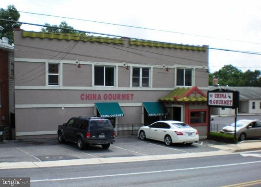 Development Opportunity   City is very interested in the redevelopment of this site!
 Approximately 1.87 Acres consisting of 2 adjoining parcels (includes rental apartment house, restaurant with apartments above, and office building)
 B-1 Zoning allows Townhouses, Apartment Units, Retail and Office Space
Utilities include: Public Water, Public Sewer, Electric 
Convenient to Downtown Winchester and U.S. Interstate 81
High Visibility Location! 
(ANA #A-641). Tax ID 213-01-P5B and 213-01-P5A.