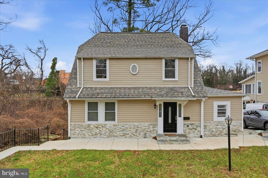 Come and tour this beautiful detached single family home in the desirable Mount Holly neighborhood of Baltimore City. This home is full of charm, sits on a quiet street, and will surely amaze you when you walk inside. The main floor features stunning Cherry Brazilian hardwood floors throughout, recessed lighting, chair and crown moldings, a gourmet kitchen with granite countertops, tile backsplash and stainless steel appliances. And, most importantly, a 1st floor primary suite with an ensuite bathroom! The primary bathroom is an owner's retreat with a custom tiled standup shower and a jacuzzi tub! The 2nd level includes 3 spacious bedrooms with all new plush carpeting and 1 exquisite full bathroom. The basement is fully finished and a wide open space to do with as you wish. Use it as a 5th bedroom, 2nd family room, or man-cave! There is also a washer / dryer, walk out access to the rear yard, and a beautiful rear deck to enjoy! Do not let this amazing home pass you by! Take a tour and see it for yourself!