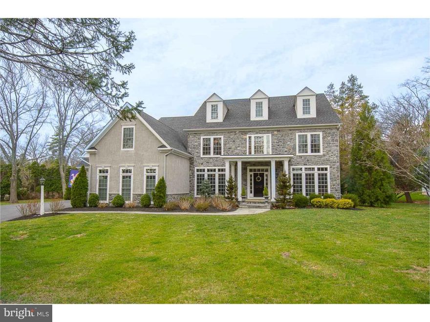 Absolutely gorgeous 5 bed/ 5 full bath, 2 powder room home- 7839 sq. ft. with 9 ft. ceilings on all three floors, 5 car garage. Located on a one-acre lot in Easttown it backs to conserved ground owned by National Lands Trust of the Cassatt Preserve. Superior craftsmanship and detail begins at the formal living room, the cherry wet bar to the beautiful cherry library.  The dining room with tray ceiling has a large butlers pantry. The family room with floor to ceiling stone wood burning fireplace and coffered ceiling has French doors to the patios. Experience the fabulous epicurean kitchen featuring a 60 in. wolf 6 burner stove with pot filler, 2 dishwashers, 2 pantries, huge center island plus desk. The sun-drenched morning room is surrounded in windows and glass door to the terrace. The stunning master suite with sitting room opens to a very charming covered porch overlooking the grounds. Bedrooms 2 & 3 are ensuite 4 & 5 are jack & Jill. There is also a childrens reading room. The walk out finished lower level has a second family room, full size wet bar, game room, work out room with stairs to the pool and full bath.  There is a 6th bedroom or office with walk up stairs to the outside. The beautiful grounds with the newly refinished salt-water pool and gorgeous patios complete this custom built home.