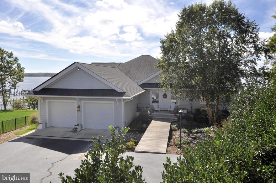 Stunning 4BR/3.5BA waterfront craftsman home, constantly updated & solar powered.  Deep water dock, 6'+ MLW.  Southern exposure for incredible sunsets from every room, decks & indoor pool.  Totally open floor plan living & walls of glass bring the outside in.  Main level master, bamboo floors, great room, high ceilings, huge kitchen w/natural tops & high-end appliances.  Ultra-quiet peninsula.