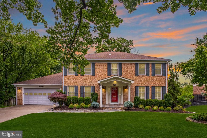 Spacious Colonial tucked away on a quiet cul-de-sac offering beautifully maintained living spaces, timeless charm, and an exceptional indoor-outdoor lifestyle. Gleaming hardwood floors extend throughout the main and upper levels, while the welcoming foyer features classic slate flooring. The main level includes a spacious living room and formal dining room with French doors opening to the expansive deck, creating the perfect setting for entertaining or relaxing while overlooking the beautifully landscaped backyard.
The inviting family room features custom built-ins, a wood-burning, brick fireplace with mantle, and French doors leading to the stunning screened porch for seamless indoor-outdoor enjoyment. The updated eat-in kitchen offers stainless steel appliances, granite countertops, recessed lighting, and a large bay window that fills the space with natural light. A private office with custom built-in cabinetry and shelving provides an ideal office or den space, while plantation shutters throughout add warmth and sophistication. A functional, large laundry/mud room with built-ins and a convenient half bath complete the main level.  Upstairs, the home offers four spacious bedrooms, including a thoughtfully customized bedroom currently outfitted as an impressive walk-in closet with built-in drawers, shelving, and hanging storage. The luxurious primary suite features a sitting room, spa-inspired bath, walk-in closet, additional closet space, and private access to a large terrace overlooking the peaceful backyard setting. The upper level also includes a full hall bath. The walk-out lower level offers exceptional versatility with a private fifth bedroom and full bath, a den with custom built-ins, and a dedicated office area featuring built-in desks and cabinetry ideal for working from home. Additional spaces include a fitness room and a large storage area with endless potential for flexible living or recreation. Doors open directly to the stone patio and beautifully landscaped backyard, creating a seamless indoor-outdoor living experience.  Two separate HVAC systems, a customized and renovated two-car garage with built-in cabinets and shelving, and an exterior storage room further enhance the home’s exceptional amenities and functionality.  Tucked away at the end of a quiet cul-de-sac in sought after Marlboro Estates yet just minutes to shops, restaurants, and commuter routes including I-395, this home offers the perfect balance of privacy, convenience, and spacious living. OFFER DEADLINE, MONDAY JUNE 1ST AT NOON
