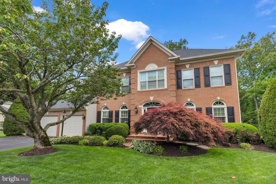 Welcome to 8323 Argent Circle in the sought-after Crosspointe community, where thoughtful upgrades, quality craftsmanship, and an amenity-rich lifestyle come together over 4,557 total square feet.  

A dramatic two-story foyer with a curved staircase opens to gleaming hardwood floors, designer lighting , and custom updated stair railings. The inviting family room  showcases vaulted ceilings, a fireplace, skylights (2021), and a wall of windows that flood the home with natural light.  

The gourmet renovated kitchen is perfectly designed for entertaining, featuring granite countertops (2024), updated cabinetry, and an updated backsplash (2022).  

A newly renovated mudroom with custom cubbies, cabinet pullouts, shelves, and built in bench is adjacent to the kitchen. 

Enjoy seamless indoor-outdoor living with a screened-in porch, an expansive deck (2009) surrounded by mature trees for privacy, and a lower-level brick paver patio (2017) with a firepit and charming swing—creating multiple spaces to relax and entertain.  

The main level includes a private office with French doors, a newly painted formal living room  for entertaining and a dining room with updated lighting and beautiful designer touches which add character throughout.  

Upstairs, four spacious bedrooms, most with custom closets, include a luxurious primary suite complete with crown molding, a sitting room/flex space, a massive custom walk-in closet, and an updated bath with new mirrors, faucets, lighting and, tile in addition to a soaking tub and glass shower. Upper-level bathrooms are enhanced with skylights. The entire upper level enjoys new carpeting throughout.

The newly renovated walkout basement includes more than 100K in upgrades, including a spacious recreation room with a full wet bar with rare, leathered marble countertop, built-in bookcases/media center, top quality soft-close cabinetry, recessed lighting, and a fully renovated  bathroom featuring a frameless glass shower, updated vanity, lighting, and flooring.  A legal fifth bedroom with a closet and adjacent den or office space provides ideal space for guests or extended living.  

Don't miss the crown molding and updated trimwork throughout the house. 

Major system updates include HVAC (2014, 2025 coil), AC Units (2014), roof (2015), furnaces (2016), windows and doors (2008), attic insulation (2024), whole house surge protector (2022), garage renovation (2020), all replacement energy efficient windows, garage doors and front door, and interior paint updates (2015–2020).  

Over $385K invested in improvements.  

Crosspointe amenities include 2 pools, tennis courts, basketball courts, Heron Pond, playgrounds, and miles of trails. HOA $350 quarterly.

Enjoy Silverbrook Elementary & South County Middle and Highschool.  Fabulous easy commute options with Commuter Lots, Metro, VRE & Pentagon bus make DC / Fort Belvoir and the entire metro area an easy commute from this home!