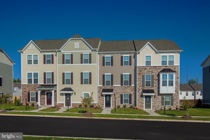 BEETHOVEN AT HIGHGATE VILLAGE. THIS BRICK HOME INCLUDES: 3 Bedroom/2 .5 Baths. Main level has Living Rm, Powder Rm and Dining area, sliding glass door to an 18x10 composite Deck, gourmet Kitchen with HUGE Island, granite countertops, backsplash, upgraded cabinets, and GE SS Appliances including refrigerator and gas range. Upper level has Luxury Owners' Suite with walk-in closet & private bath, 2 additional Bedrooms, hall Bath and bedroom level Laundry. Lower level has Foyer, Powder Rm, Study and Finished Recreation Rm with walk-out to back yard and 2-piece rough-in. Photos are representative only.