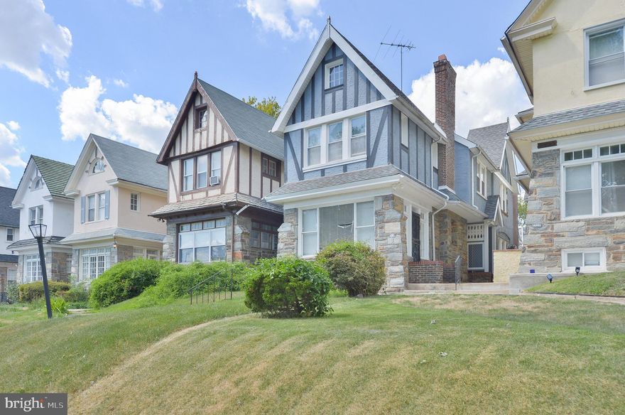 Welcome to this spacious 2000 sq. foot, 4 bedroom 2.5 bath, rarely offered stone twin, located very close St. Josephs University, shopping, dining, and various forms of public transportation; on one of the largest streets in the Wynnefield section of Philadelphia. Additionally, this home offers a bright and cozy sun porch, an updated bathroom, hardwood flooring, crown molding, a wood-burning fireplace, central air, a spacious rear deck, an oversized rear garage and much more. 
Walk out the kitchen door to a spacious deck that allows for a place to sip your morning coffee or tea, enjoy an afternoon read, or sit/lie back and relax after a hard day’s work. There are four bedrooms and two full bathrooms on the second level. What is more is that this super spacious home is perfect for entertainment of your favorite family members and friends. Next in line you will experience the sunny sun porch area just off of the serene living room, followed by the dining room and kitchen. This home offers even more- a driveway that leads to a spacious garage (approx. 308 sq ft), existing laundry hook-ups, recess lighting throughout, ceiling fans, new dishwasher , hardwood flooring, and more. 

Property is being sold AS-IS

Listing Agent is the Property Owner.